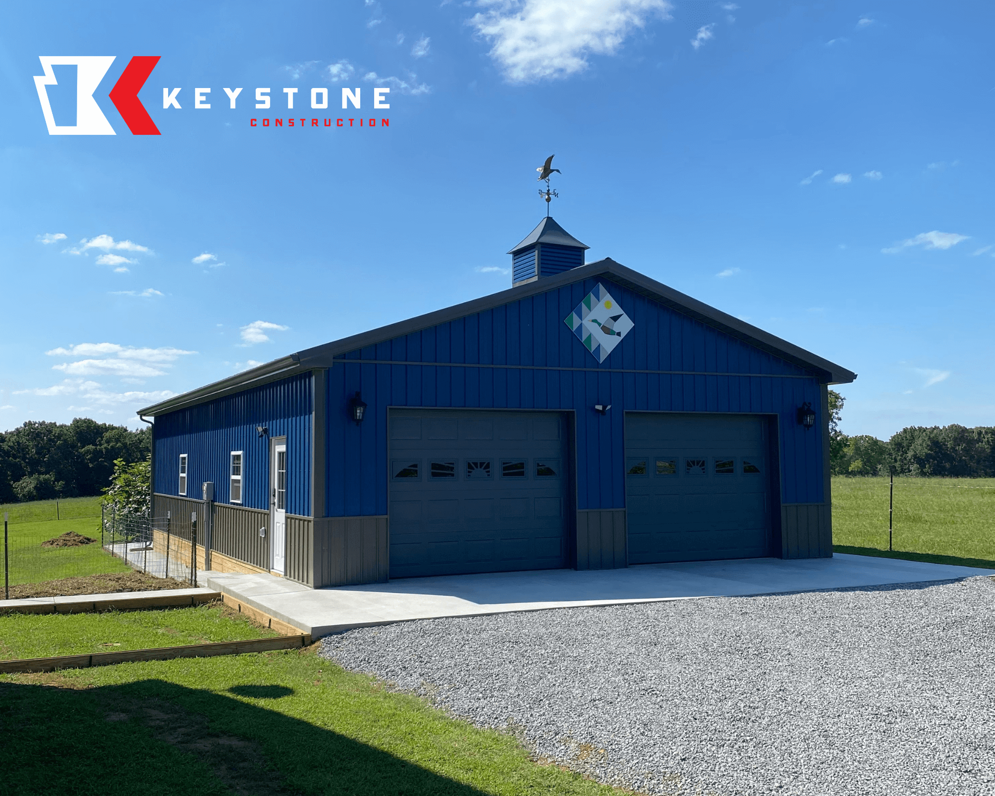 Farm Post-Frame Construction | Insulated Workshop with Green Doors | Keystone Construction | Farm Storage